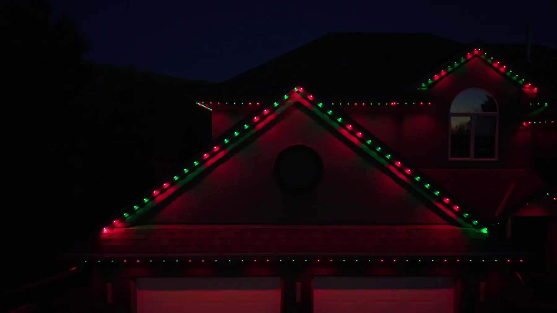 The same house lit in christmas